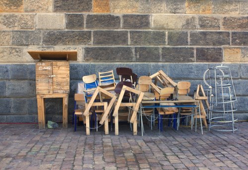 Bulky sofa and chairs ready for local furniture disposal collection