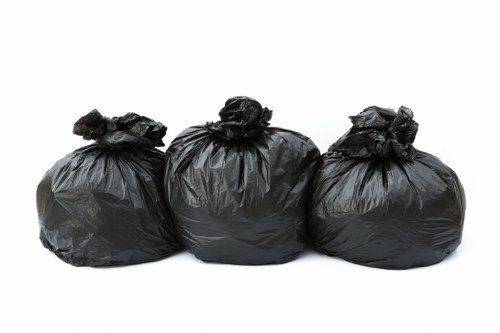 Flat clearance team handling bulky waste removal from a local apartment building