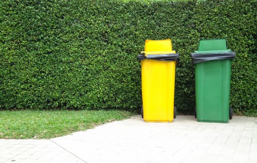 Professional litter pickup in a shared alleyway and access path