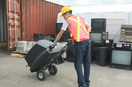 Large furniture and appliances prepared for waste removal collection
